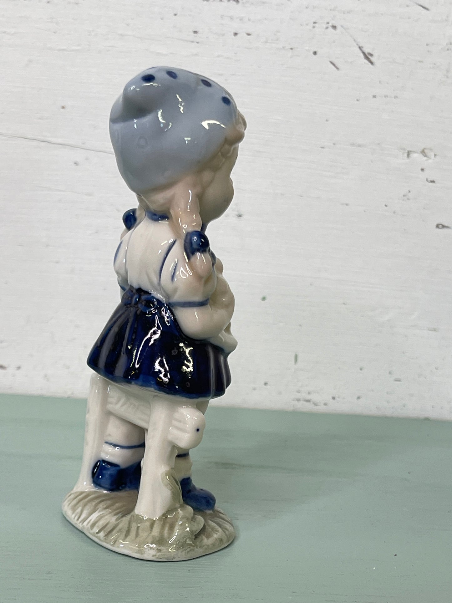 Porcelain Girl with Chicks in Hand, white and Blue Dress Figurine
